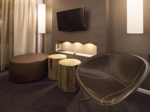 TV a/nebo společenská místnost v ubytování Laponia Hotell & Konferens