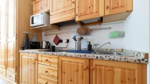 Кухня или мини-кухня в Appartamento Santa Caterina
