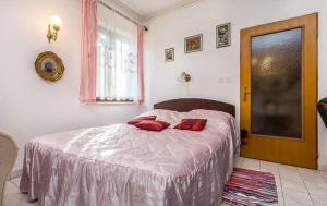Postel nebo postele na pokoji v ubytování Apartments Bardak