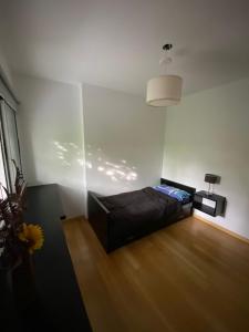 Postel nebo postele na pokoji v ubytování Espacioso departamento 2 dormitorios ubicado en inmejorable zona de la plata