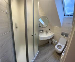 Ein Badezimmer in der Unterkunft Hotel MyLord