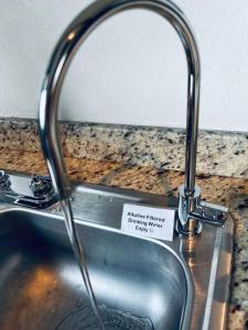 a kitchen sink with a faucet on top of it at Departamento Exclusivo, High Apartment with Great Location 4-B in Matamoros +28 photos