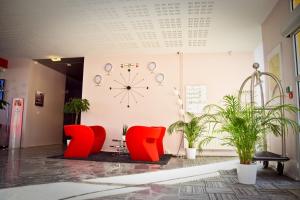 Un lugar para sentarse en Carré Py' Hôtel