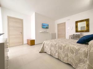 Postel nebo postele na pokoji v ubytování B&B Casa Desimio