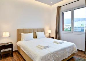 Postel nebo postele na pokoji v ubytování Boutique40 Luxury Apartment