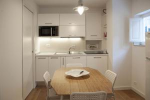 Kitchen o kitchenette sa Casa l'Amuri