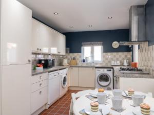 Køkken eller tekøkken på Quay Cottage