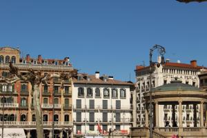 a group of buildings and a building with a dome at Aloha Apartamentos in Pamplona