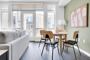 a living room with a couch and a table and chairs at Berkeley 1BR w Gym WD Roof nr Highways SFO-1059 in Berkeley