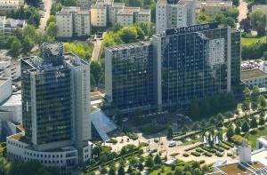an overhead view of two tall buildings in a city at 1 Zimmer Appartement im SI Centrum Stuttgart in Stuttgart +2 photos