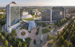 an aerial view of a city with tall buildings at 1 Zimmer Appartement im SI Centrum Stuttgart in Stuttgart
