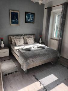 Seaside holiday house Plomin Luka, Labin - 7466にあるベッド