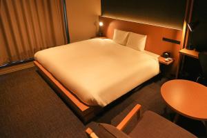 Postel nebo postele na pokoji v ubytování N Plus Hotel Akihabara