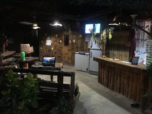 TV a/nebo společenská místnost v ubytování Coco Garden Villas