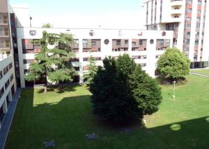 ヴェローナにあるCasa Marillaの庭木のある建物の上面