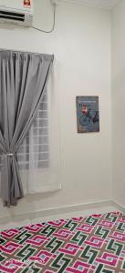 Afbeelding uit fotogalerij van Sofea Hana Homestay, Pantai Balok, Kuantan in Kuantan +11 foto's