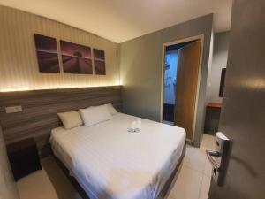 Letto o letti in una camera di One Point Hotel