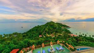 an aerial view of an island in the ocean at Ko Tao Resort Paradise Zone - SHA Plus in Ko Tao