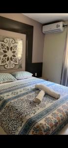 Rúm í herbergi á Curasita Colour Appartments & Resort - adres kaya Sucre nst 282