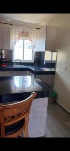 Eldhús eða eldhúskrókur á Curasita Colour Appartments & Resort - adres kaya Sucre nst 282