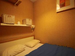 Łóżko lub łóżka w pokoju w obiekcie Bel appartement à Morzine, 2 chambres, proche centre, 6 pers, balcon, parking - FR-1-524-116