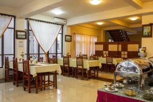 Majoituspaikan Inle Apex Hotel ravintola tai vastaava paikka