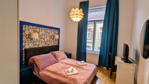 Posteľ alebo postele v izbe v ubytovaní FreeParking - Great Synagogue Apartment, 2 bedroom, 5 people ,WiFi, AC