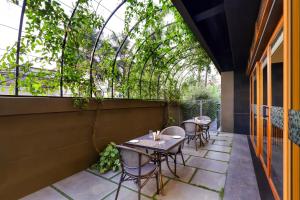 Balkón nebo terasa v ubytování Keys Prima By Lemon Tree Hotels, Thekkady