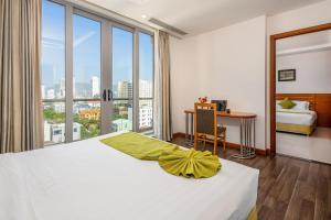 Postel nebo postele na pokoji v ubytování Richico Apartments And Hotel