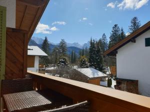 a balcony with a view of the mountains at Haus Bergrausch in Krün