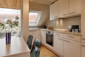 Köök või kööginurk majutusasutuses City-Apartment, Balkon & Parkplatz- by homekeepers