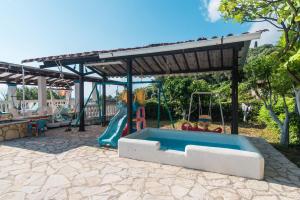 The swimming pool at or close to Andromaches large apartment 2