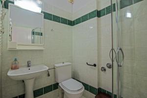 A bathroom at Andromaches large apartment 2