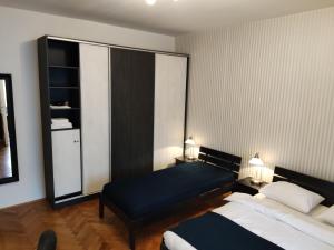 Letto o letti in una camera di Selection Rooms