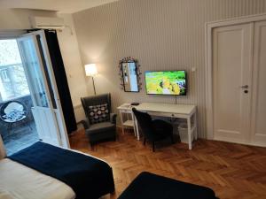 TV o dispositivi per l'intrattenimento presso Selection Rooms