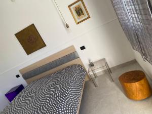Postel nebo postele na pokoji v ubytování B&B Terra Marique