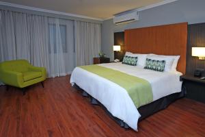 Vuode tai vuoteita majoituspaikassa Aranjuez Hotel & Suites