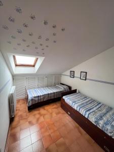 Cama o camas de una habitación en Nunzia - Trilocale con terrazzo vista mare e doppi servizi