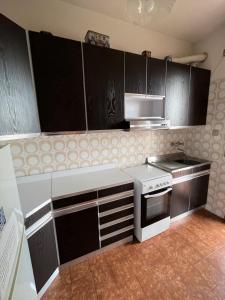 Virtuvė arba virtuvėlė apgyvendinimo įstaigoje Nunzia - Trilocale con terrazzo vista mare e doppi servizi