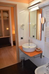 Koupelna v ubytování Hotel I Cedri