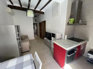 Kuchyňa alebo kuchynka v ubytovaní AR35 Coqueto apartamento en primera línea del casco antiguo