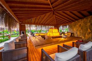 A seating area at Rubi Platinum Sign