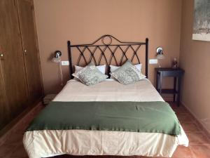 Łóżko lub łóżka w pokoju w obiekcie Casa situada en un entorno natural Casa Rural La Serena