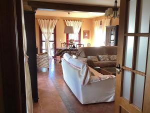 Część wypoczynkowa w obiekcie Casa situada en un entorno natural Casa Rural La Serena