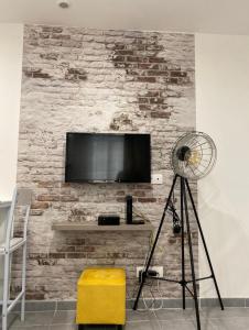 Televízia a/alebo spoločenská miestnosť v ubytovaní Studio 23m2 moderne hypercentre - Arènes à 2 min