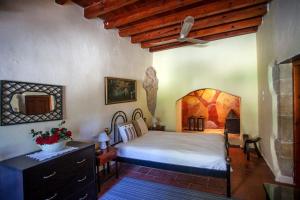 Tempat tidur dalam kamar di Villa Polirinia
