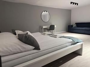 Katil atau katil-katil dalam bilik di JobelHome Blaha Apartment