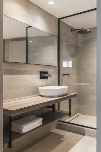 Een badkamer bij Boutique Hotel 'Hof ter Duinen'