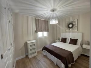 Ένα ή περισσότερα κρεβάτια σε δωμάτιο στο La Quinta Paradise +18 φωτογραφίες