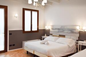 Venicegreen Agriresort客房内的一张或多张床位